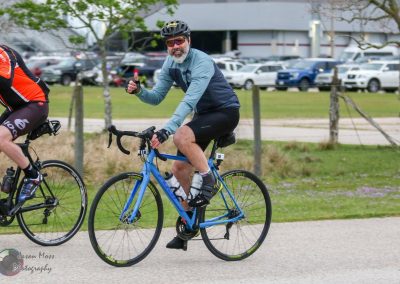Bluebonnet Express cycling event, cyclist giving thumbs up, outdoor exercise, biking, community ride, healthy lifestyle, Texas.