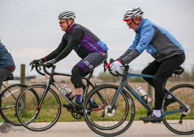 High-performance cycling with Bluebonnet Express bicycles during a group ride.