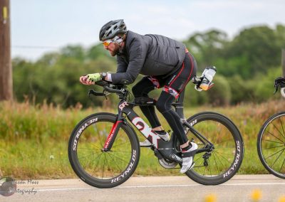 High-performance electric bike rider participating in Bluebonnet Express cycling event in Texas.