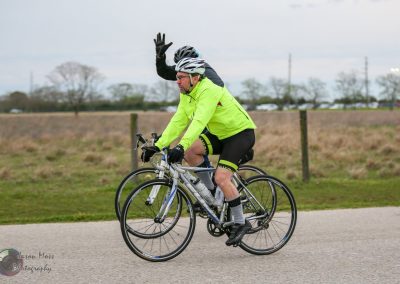 - Cycling enthusiasts riding on a scenic trail with Bluebonnet Express bikes, emphasizing outdoor adventures and health.