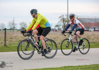 Cyclists riding e-bikes at Bluebonnet Express event for outdoor recreation and biking enthusiasts.