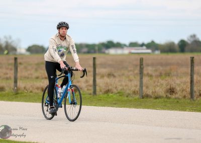 Bike ride along scenic countryside road during daytime.