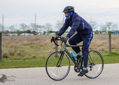 Comfortable cycling on Bluebonnet Express bike trail in casual sportswear.
