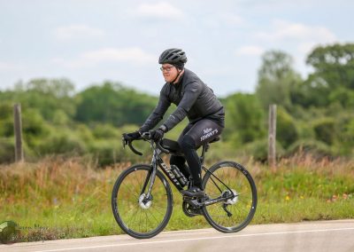 All-Black Bike Ride with Enthusiastic Cyclist on Bluebonnet Express Route.