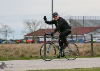 Bike ride at Bluebonnet Express outdoor cycling event, promoting fitness and community.
