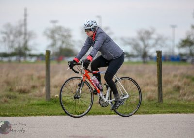 Bright orange road bike for the Bluebonnet Express cycling event in Texas.