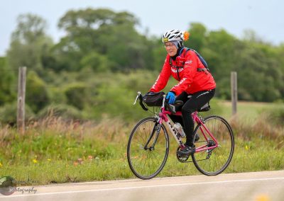 Vintage bike rider on scenic trail enjoying outdoor cycling.