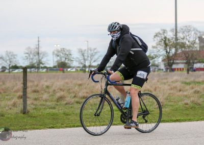 Bicycle rider participating in Bluebonnet Express cycling event in Texas, outdoor sports, cycling race.