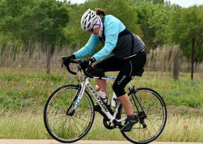 Bike riding along scenic trail in Texas countryside.