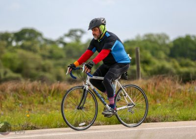Smooth riding on Texas roads with Bluebonnet Express cycling tour, scenic outdoor bike adventure.