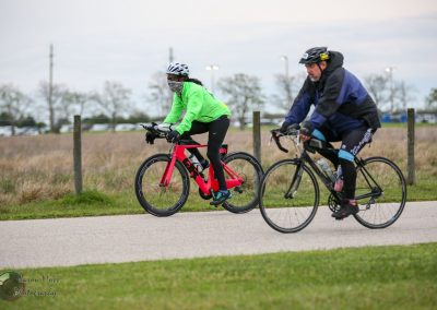 Bicycle riders on the trail, promoting eco-friendly transportation and outdoor exercise in Texas.