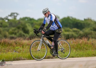 Enjoying cycling on scenic Texas trails with Bluebonnet Express bike ride event.