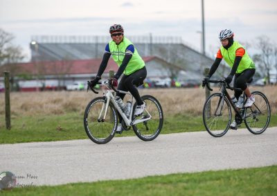 Brightly dressed cyclists enjoying a ride on the Bluebonnet Express trail.