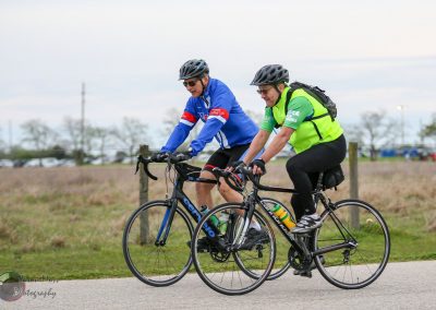 Comfortable cyclist duo riding on a Bike during Bluebonnet Express event in Texas.