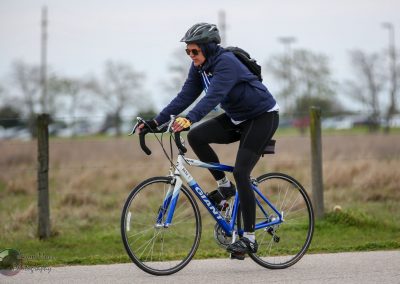 Comfortable mountain biking with Bluebonnet Express on a scenic outdoor trail, showcasing eco-friendly transportation.
