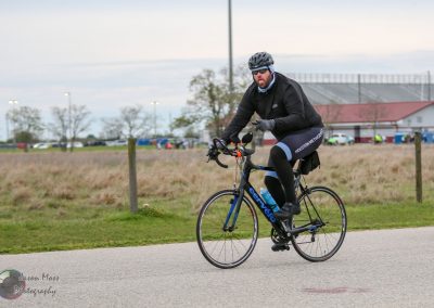 Velo cyclist on Bluebonnet Express route, Houston Metro cycling event, outdoor biking race.