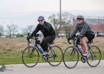 Riders on Bluebonnet Express cycling route, enjoying outdoor Texas bike trail.