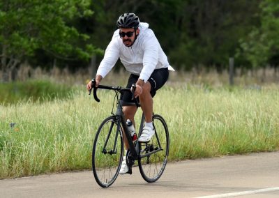 Smooth riding experience with Bluebonnet Express bike on scenic outdoor trails.
