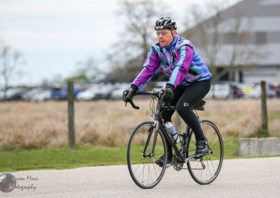 Comfortable electric bike rider enjoying Bluebonnet Express cycling route.