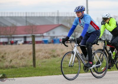 Bicycle ride with cyclists in Bluebonnet Express event, Texas countryside scenery.