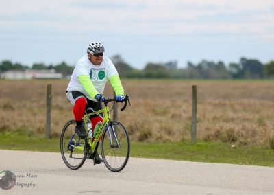 Rider on a road bicycle participating in Bluebonnet Express charity bike ride event.