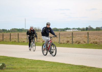 Bluebonnet Express bike ride with friends on scenic rural trail, enjoying outdoor cycling adventure in Texas.
