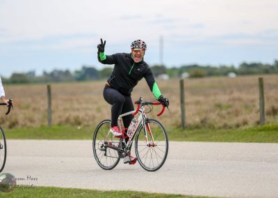 Vibrant cyclist riding in Bluebonnet Express event, celebrating cycling and outdoor activities in Texas.