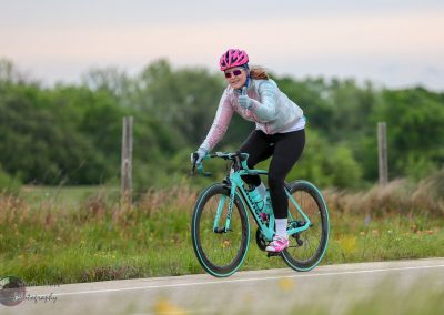 Bright pink helmet, biking, women cyclist, outdoor, speed, leisure, Bluebonnet Express, Texas, adventure, cycling.