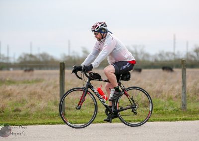 Smooth riding cyclist on specialized bike, enjoying outdoor cycling experience.