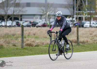 Bike rider on a road bike participating in Bluebonnet Express cycling event, showcasing endurance and athleticism.