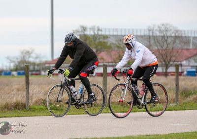 High-performance cycling with Bluebonnet Express bikes in an outdoor race setting.