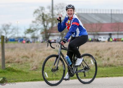 Vibrant cyclist enjoying Bluebonnet Express bike route outdoors in Texas.