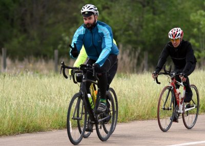 Active cycling on scenic trail with Bluebonnet Express bicycle.