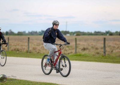 Enjoying outdoor biking on the Bluebonnet Express trail in Texas, perfect for cyclists seeking scenic rural routes.
