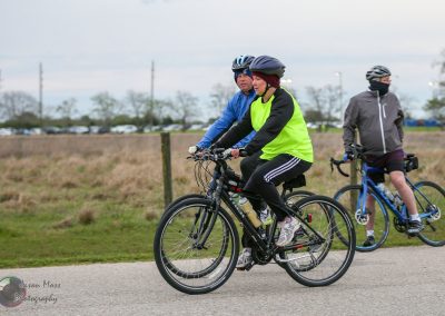 Comfortable cycling with Bluebonnet Express bike ride, outdoor scenery, group adventure, scenic route, exercise, fun biking experience.