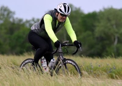 High-Performance Cycling on Bluebonnet Express trail in Texas, cyclist enjoying scenic outdoor ride.