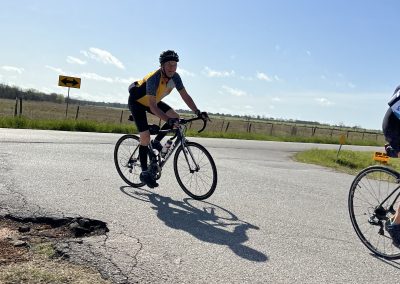 Smooth bike ride on scenic road with Bluebonnet Express, perfect for cycling enthusiasts and outdoor adventures.