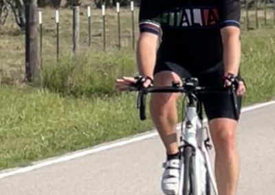 Smooth riding cyclist on the scenic route in Texas for outdoor adventure and cycling enthusiasts.