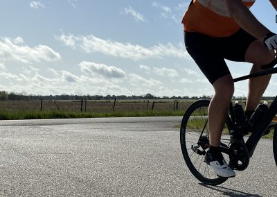 Smooth paved road cycling adventure with a cyclist enjoying outdoor riding experience.