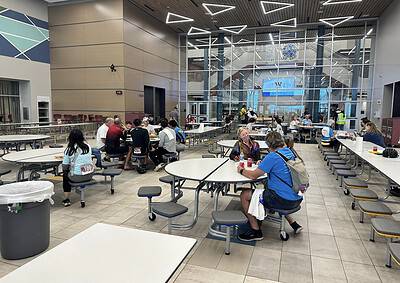 Comfortable indoor waiting area at Bluebonnet Express bus terminal, featuring modern design and seating arrangements.