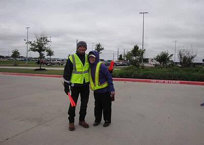 Emergency responders in high-visibility vests promoting Bluebonnet Express bike safety.