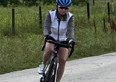 Bike riding with Bluebonnet Express bicycle, outdoor scenic countryside, female cyclist, Texas bike trail.