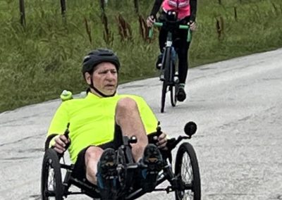 Enjoying outdoor cycling fun at Bluebonnet Express trail in scenic rural Texas. Friendly bikes and diverse riders for all ages.