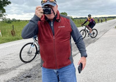 Enjoying a scenic Bluebonnet Express bike ride on a cloudy day with fellow cyclists.