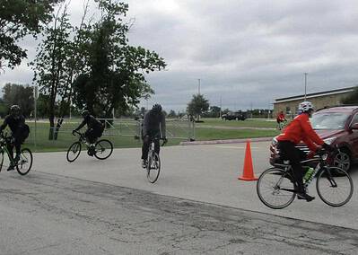 Bike riders participating in Bluebonnet Express cycling event in Texas.
