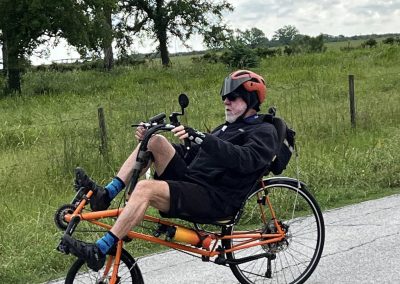 Zulu fat tire recumbent bike in outdoor landscape environment, eco-friendly transportation, Bluebonnet Express.