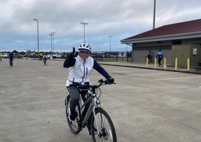 Bike rider at Bluebonnet Express, promoting cycling and outdoor activities.
