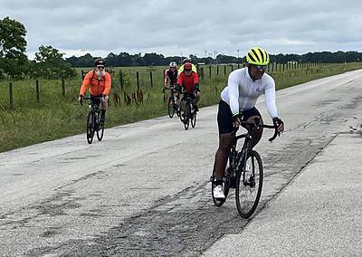 Riders on the Bluebonnet Express bike route enjoying a scenic outdoor cycling experience.