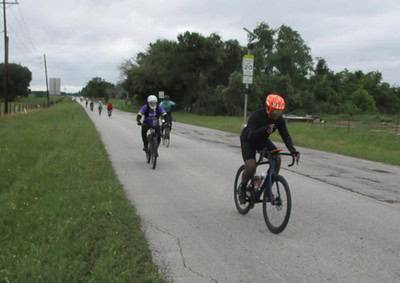 Biking group on scenic bike trail near Bluebonnet Express, outdoor cycling adventure.