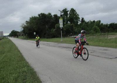 Kids riding bikes on a scenic trail in Texas, part of Bluebonnet Express bike tour.